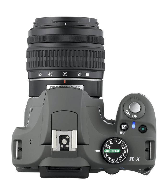 Pentax K-x -  цифровой зеркальный фотоаппарат в 12 цветовых решениях